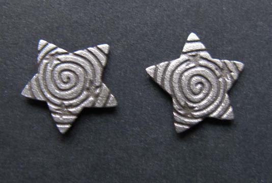 Star with swirl post earrings